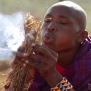 kenya-masai-mara-maasai-tribe-nick-saglimbeni-africa-making-fire